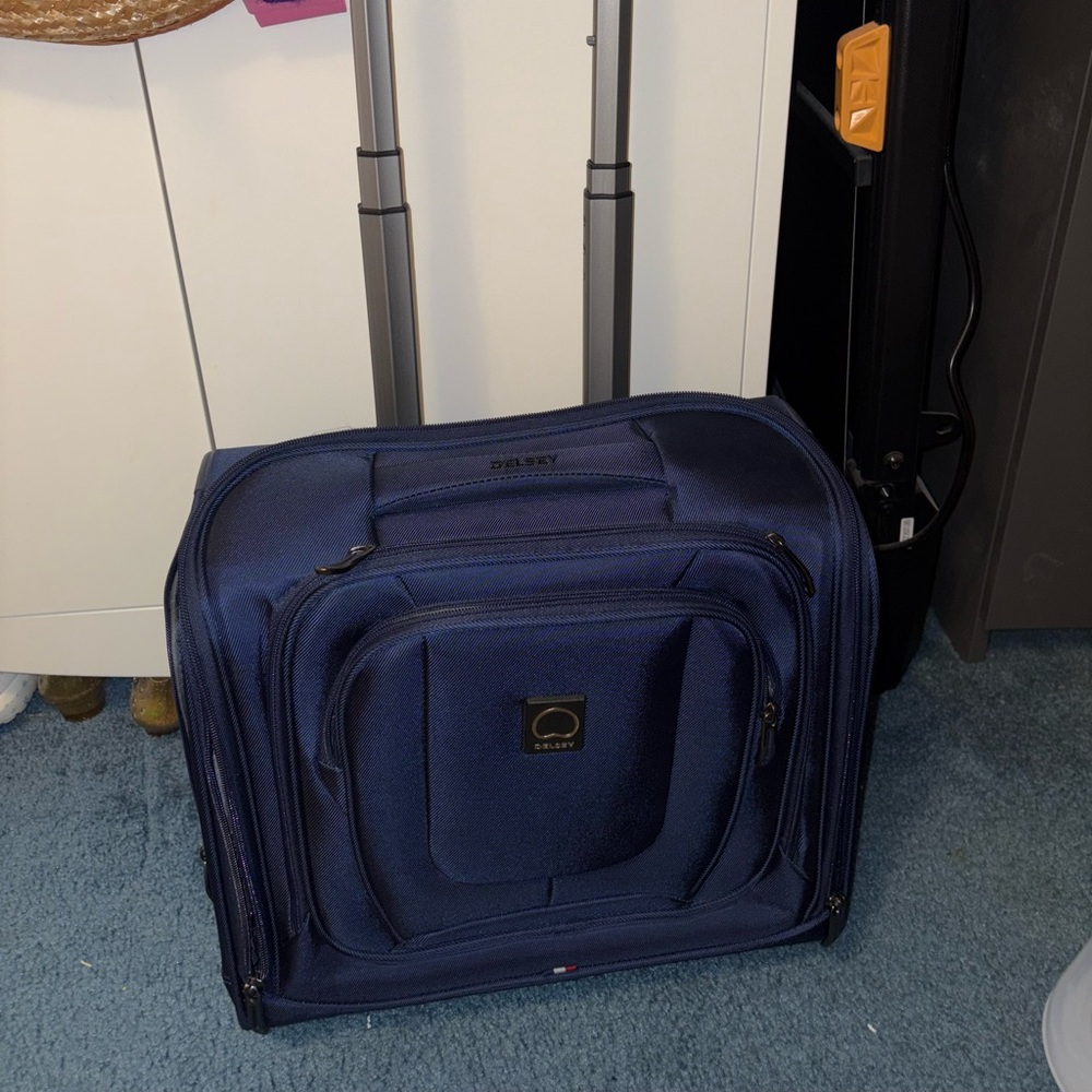 Delsey Navy Blue Rolling Suitcase